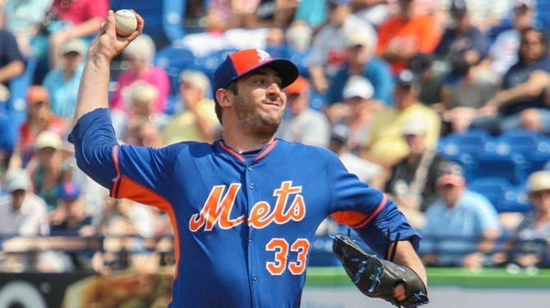 Matt Harvey pitches during the second inning of a spring...