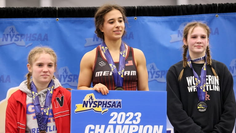 Mepham's Yianna Foufas stands on the podium after winning the...