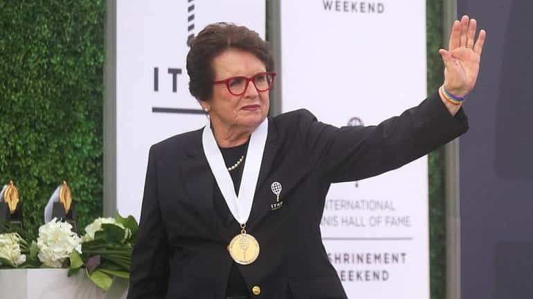 Billie Jean King leaves the stage after being inducted as...