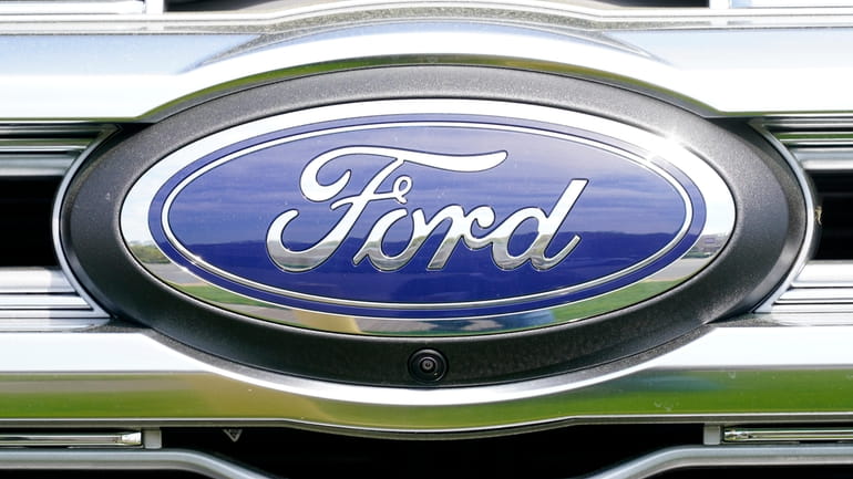 A logo on a vehicle at a Ford dealership in...
