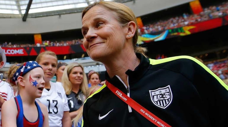 Head coach Jill Ellis of the United States greets fans...