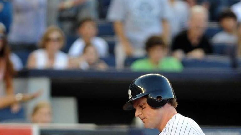 New York Yankees' Austin Kearns (26) collects his thoughts after...