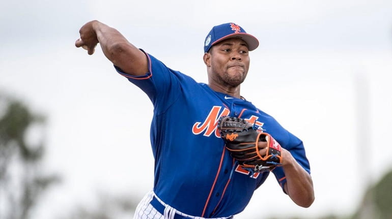 Mets pitcher Jeurys Familia pitches during a spring training workout...
