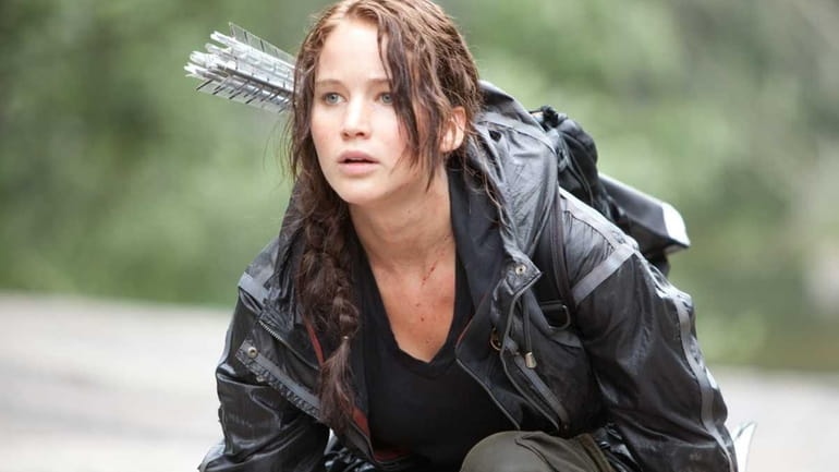 Jennifer Lawrence stars as Katniss Everdeen in "The Hunger Games,"...