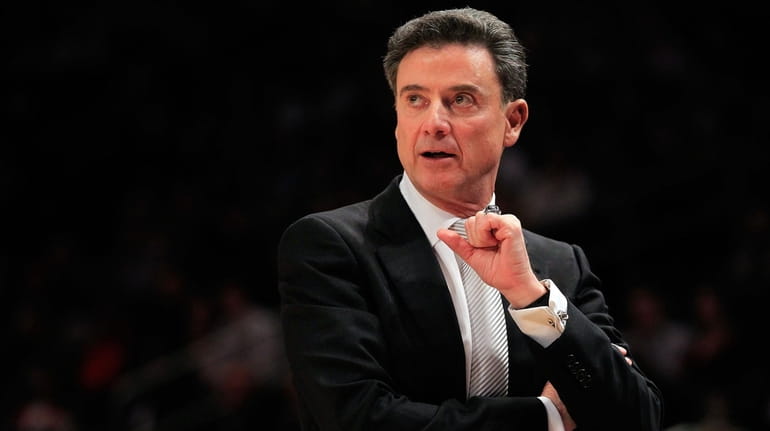 Then-Louisville head coach Rick Pitino shouts from the sidelines against Seton...