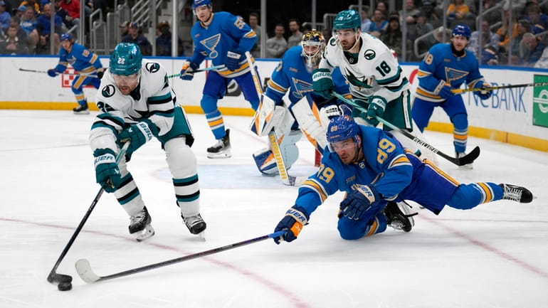 St. Louis Blues' Pavel Buchnevich (89) and San Jose Sharks'...