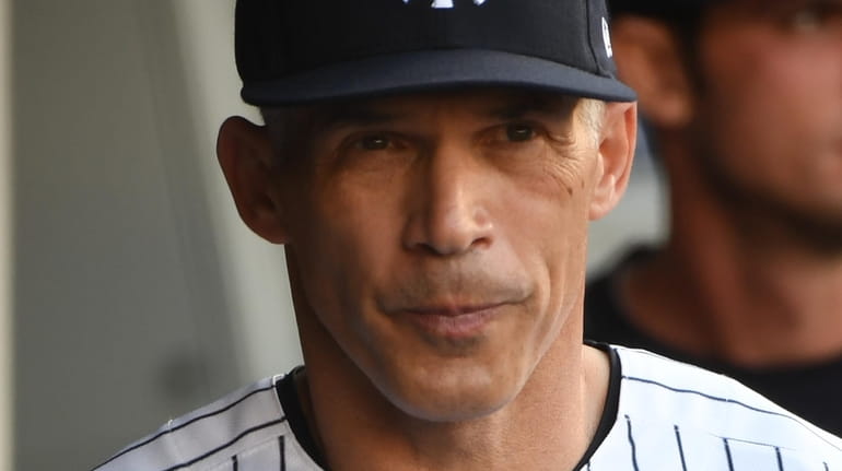 New York Yankees manager Joe Girardi looks on from the...