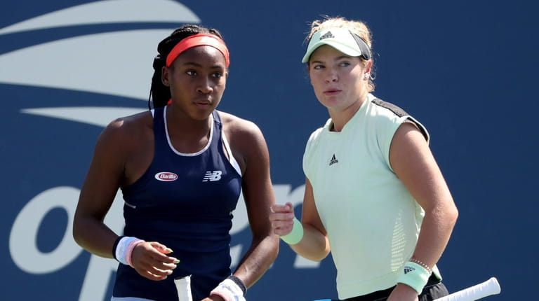 Coco Gauff, left, and Catherine McNally, both of the United...