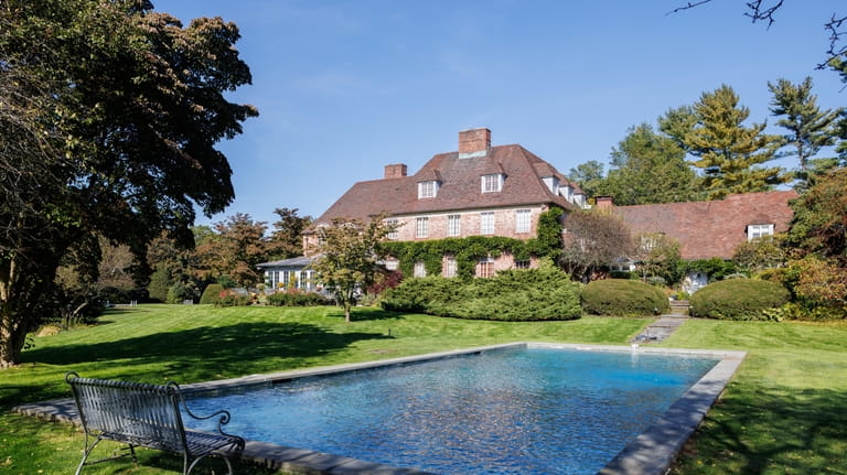 The 10.4-acre property has a pool and U.S. Open-grade tennis...