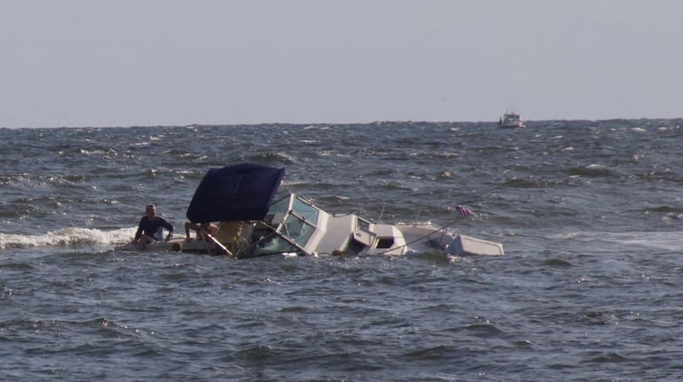 Overturned boat off of Malibu Beach Club in Lido Beach Monday.