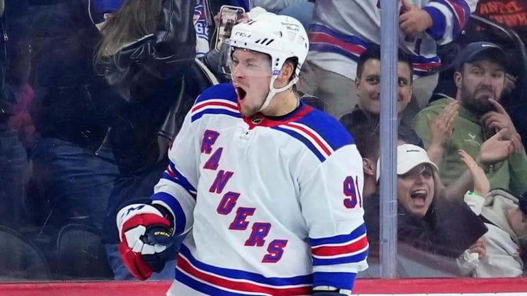 The Rangers' Vladimir Tarasenko celebrates after scoring the game-winning goal...