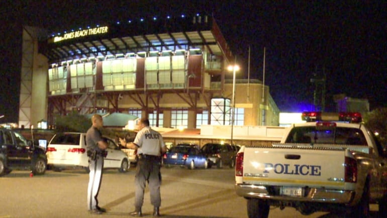 Police outside Jones Beach Theater after a man was seriously...