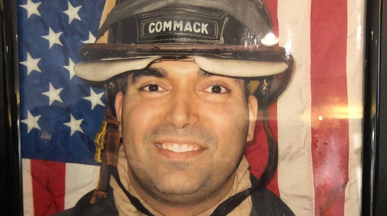 Christopher J. Raguso, picturered in his Commack Fire Department gear. Raguso,...