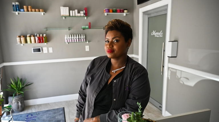 Marisol Joseph, owner of Marisol's Beauty Touch in Huntington, says the price of...
