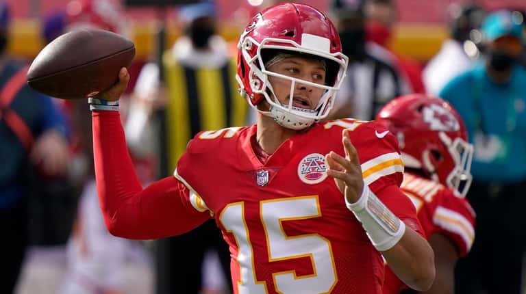 Chiefs quarterback Patrick Mahomes passes against the Panthers during the first...