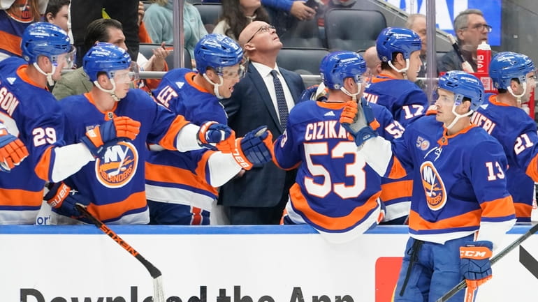 Islanders center Mathew Barzal celebrates after scoring during the first period...
