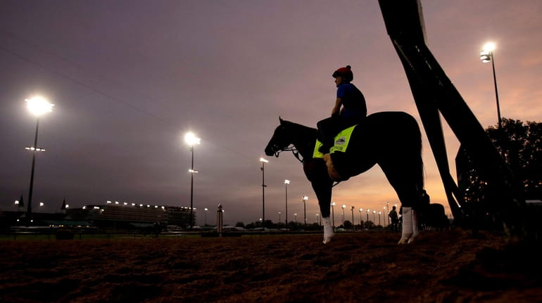 Kentucky Derby entrant Code of Honor waits to take a...