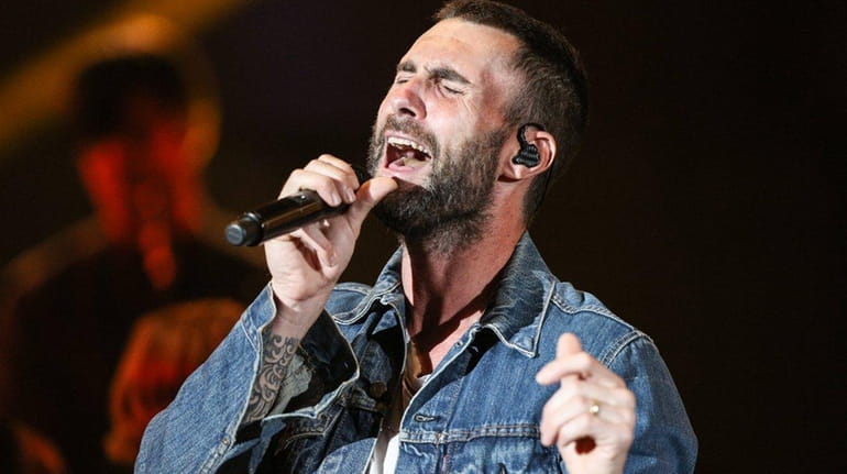 Adam Levine of Maroon 5 performs at a concert on...