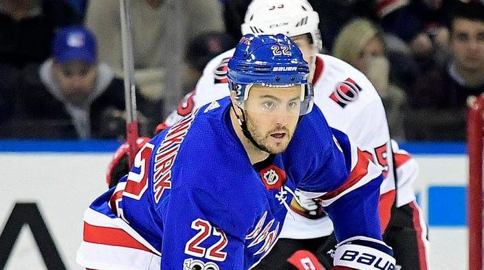 Rangers' Kevin Shattenkirk carries the puck out of the zone...