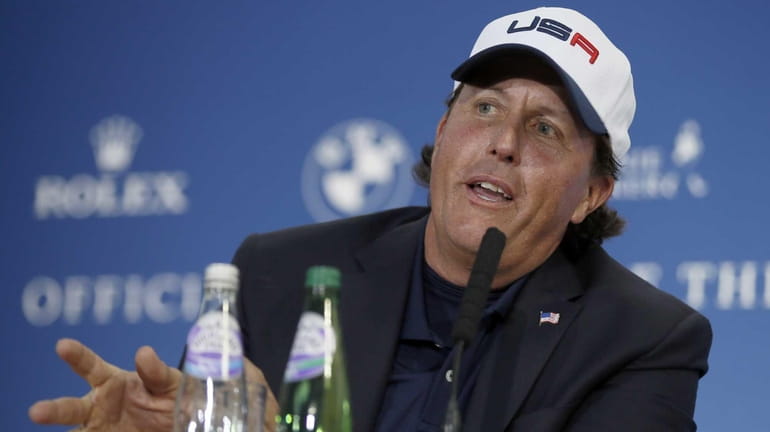 Phil Mickelson of the US speaks during a press conference...
