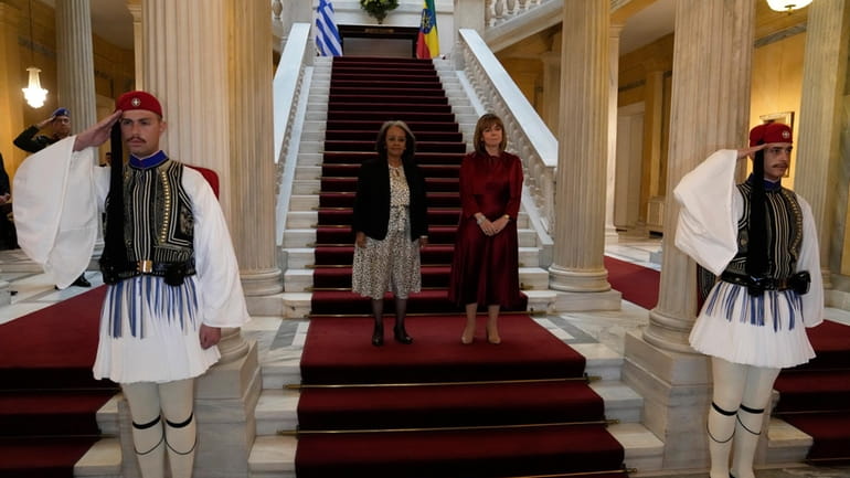 President of Ethiopia Sahle-Work Zewdein, left, and her Greek counterpart...