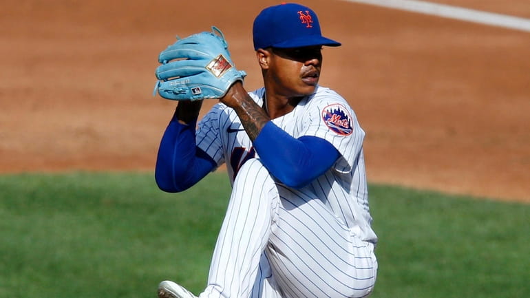 Marcus Stroman of the New York Mets pitches during an...