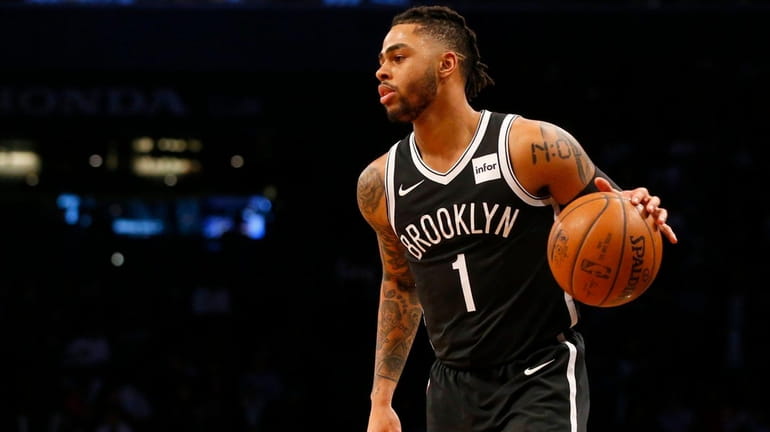 D'Angelo Russell of the Nets controls the ball in the...