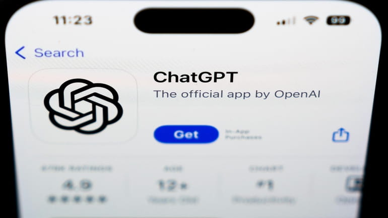 A ChapGPT logo is seen on a smartphone in West...