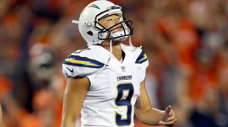 Los Angeles Chargers kicker Younghoe Koo (9) reacts after his...