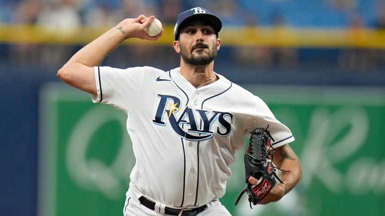 Tampa Bay Rays starting pitcher Zach Eflin delivers to the...