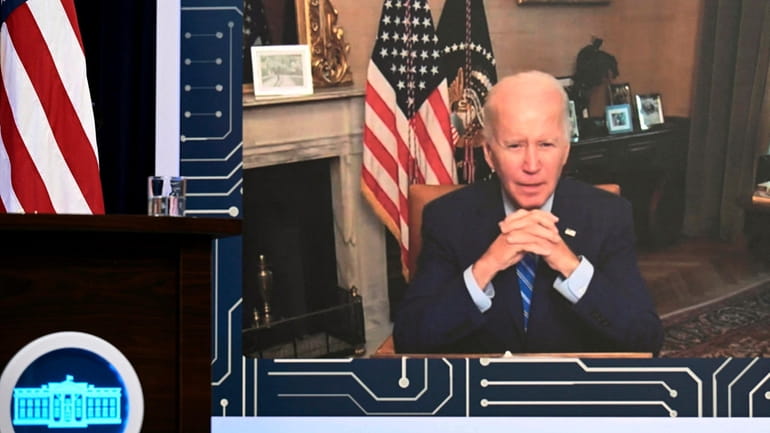President Joe Biden speaks virtually during a meeting last week...