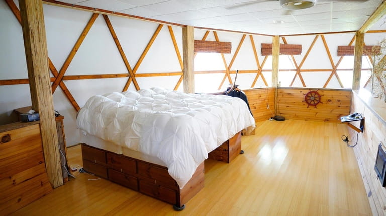 A second-floor bedroom was designed to look like a ship.