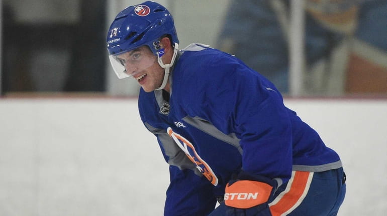 New York Islanders' Thomas Hickey skates at training camp on...