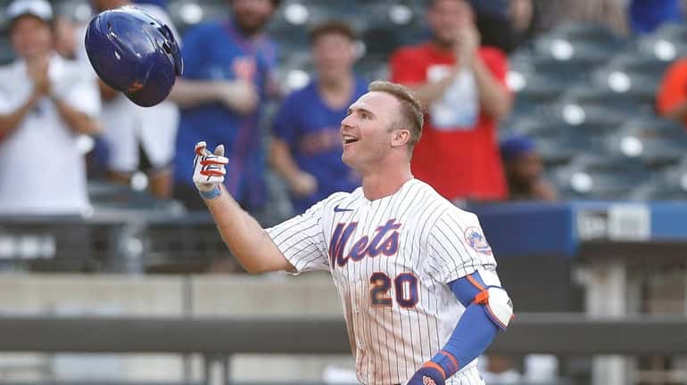 Pete Alonso of the Mets celebrates his walk-off home run...