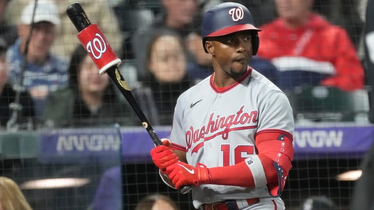 The pitch clock counts down as Washington Nationals' Victor Robles...