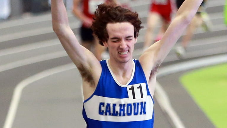 Logan Schaeffler of Calhoun wins the boys 1,600-meter run in...