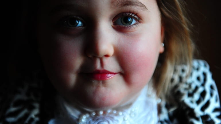 Marisa Carney, 5, is one of only 75 worldwide to...