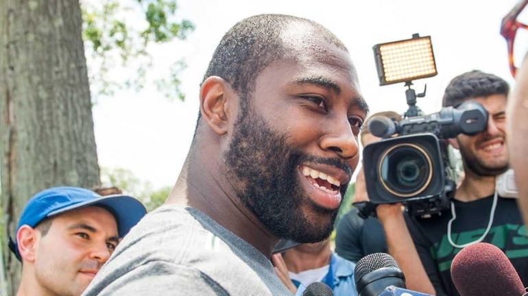 Jets cornerback Darrelle Revis reports for training camp at the...