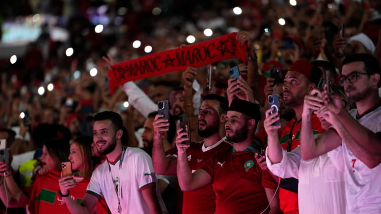 Morocco fans attend the World Cup group F soccer match...