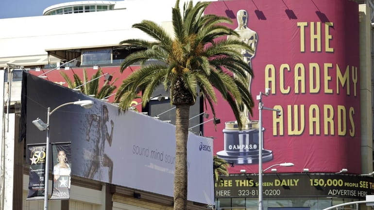 A commercial billboard described as a "supergraphic" ad for Asics...