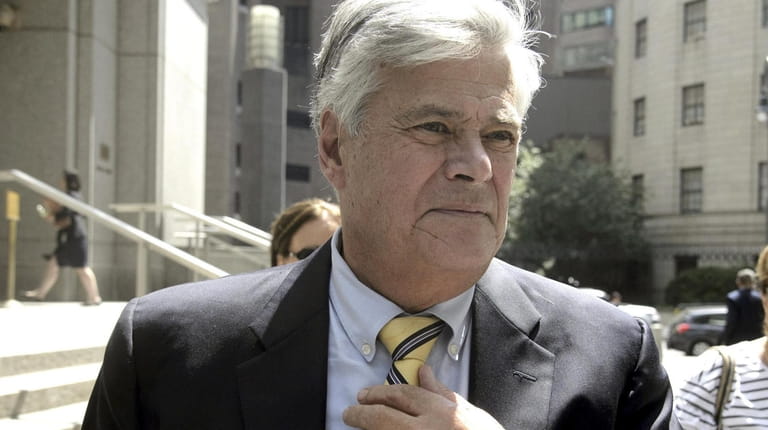 Dean Skelos exits a federal courthouse in Manhattan on July 11, 2018...