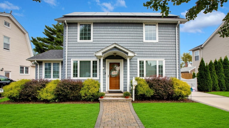 Priced at $869,000, this Colonial on Jerome Avenue was renovated in...