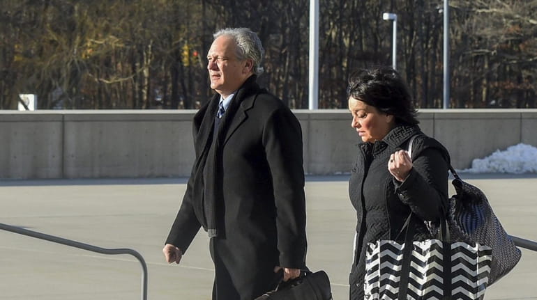 Ed and Linda Mangano arrive at federal court in Central...