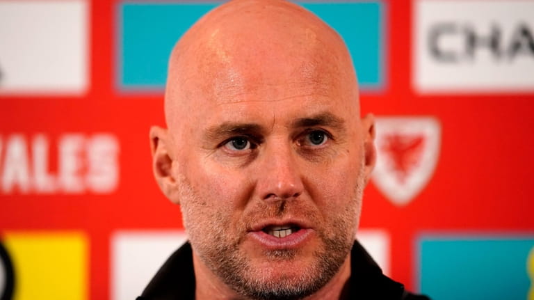 Wales manager Rob Page meets the media during a press...