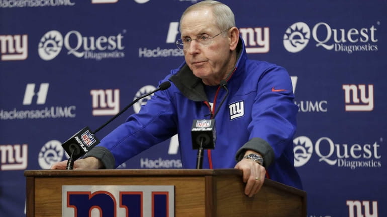Tom Coughlin talks to the media during an availability before...