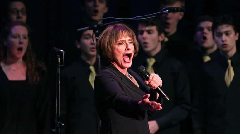 Actress Patti LuPone performs with students from Northport's high school...