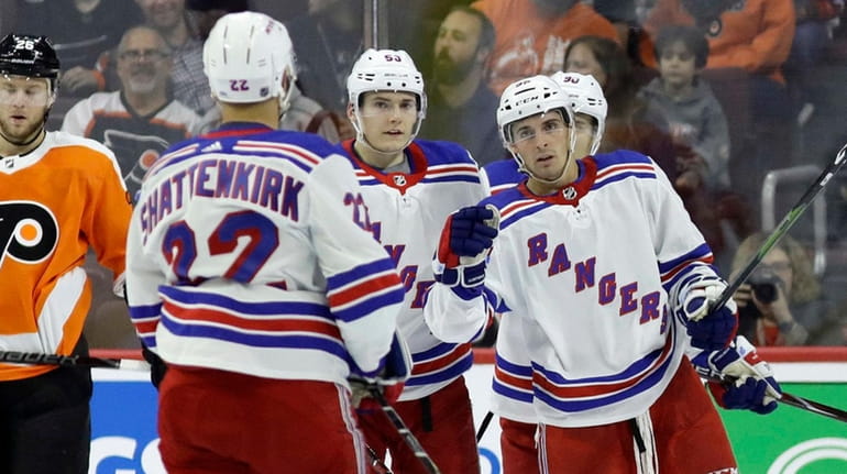 The Rangers' Vinni Lettieri, right, celebrates with Kevin Shattenkirk after...