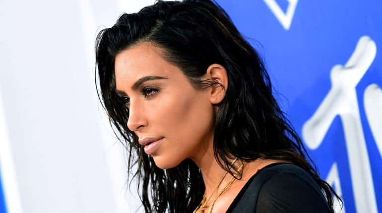 Kim Kardashian says surrogacy is an option as she seeks...