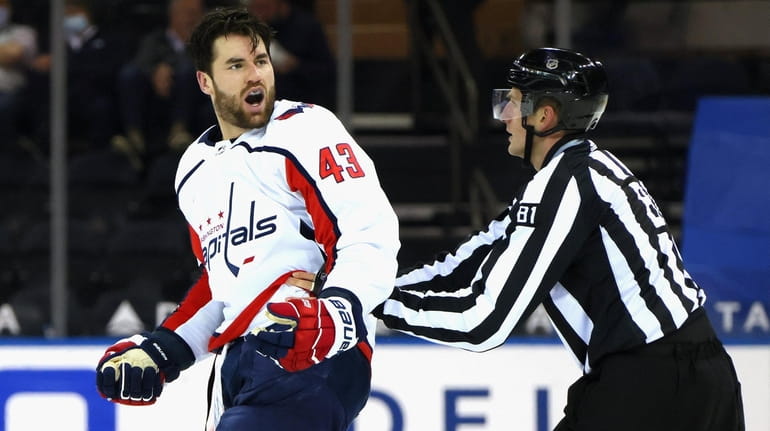 Tom Wilson of the Capitals yells at the Rangers bench after...
