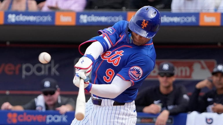The Mets' Brandon Nimmo doubles during the third inning of...
